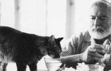 EH8505P

Ernest Hemingway at table with his cat Cristobal at Finca Vigia.