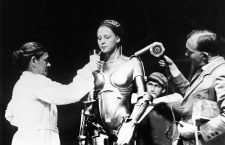 An exceptionally rare behind-the-scenes image of Brigitte Helm as the robot Maria (without her helmet) from the set of the seminal Expressionist masterpiece Metropolis (1927, Fritz Lang) 
10th January 1927 - Fritz Lang's futuristic film Metropolis is released in Germany.