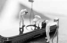Miniature people : Police And Detective are working on smartphone , Crime scene investigation , Cyber crimes concept