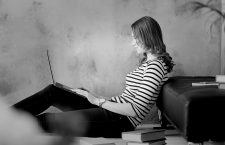Student. Woman at home with laptop